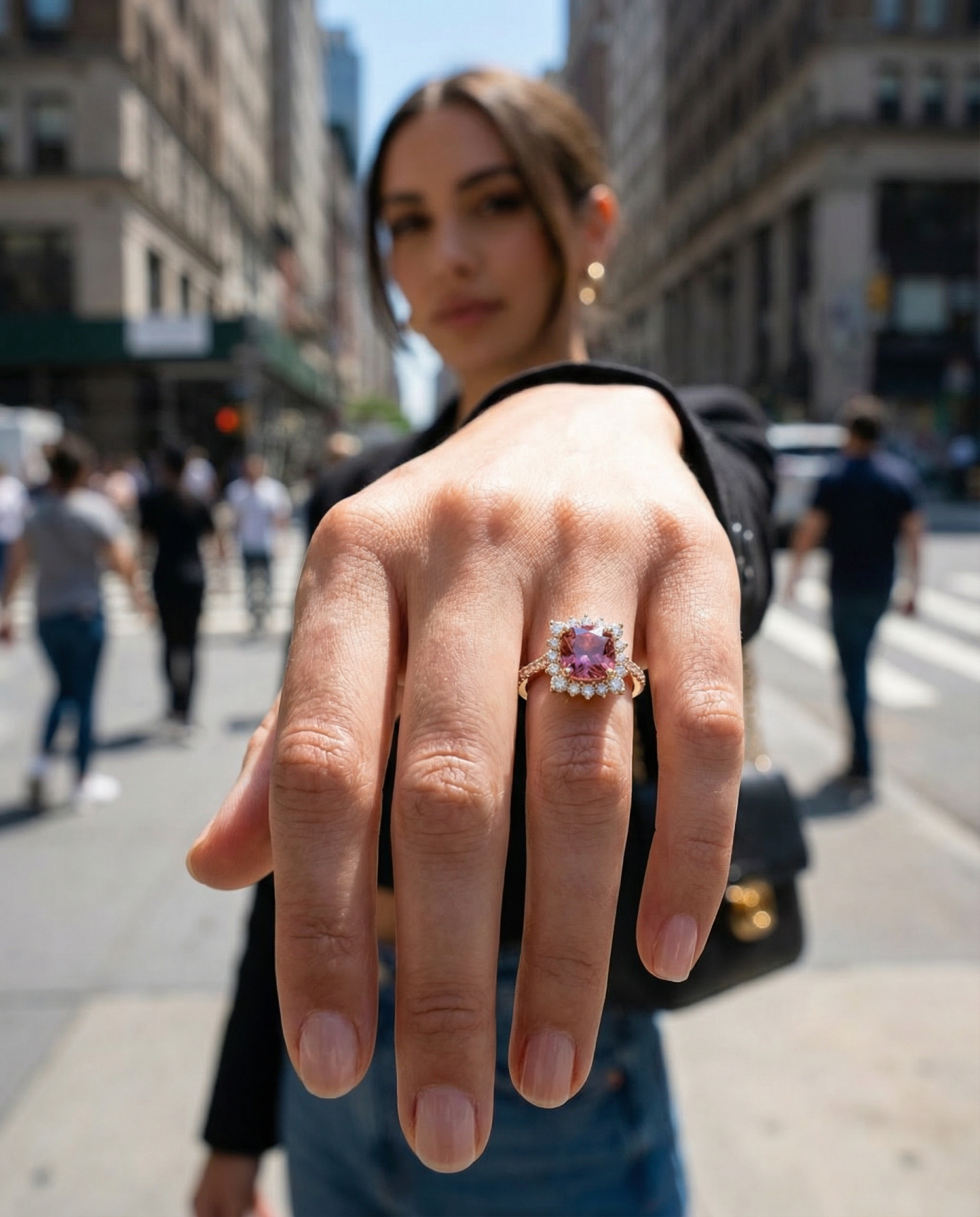 Two women showing their gemstone rings from the Round Table